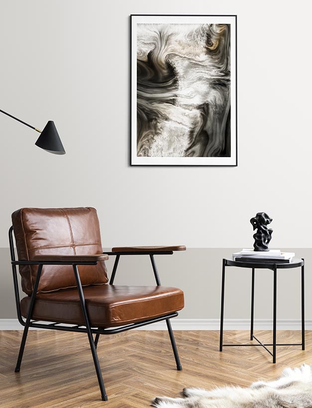 Picture frame by a reading coffee table in a living room